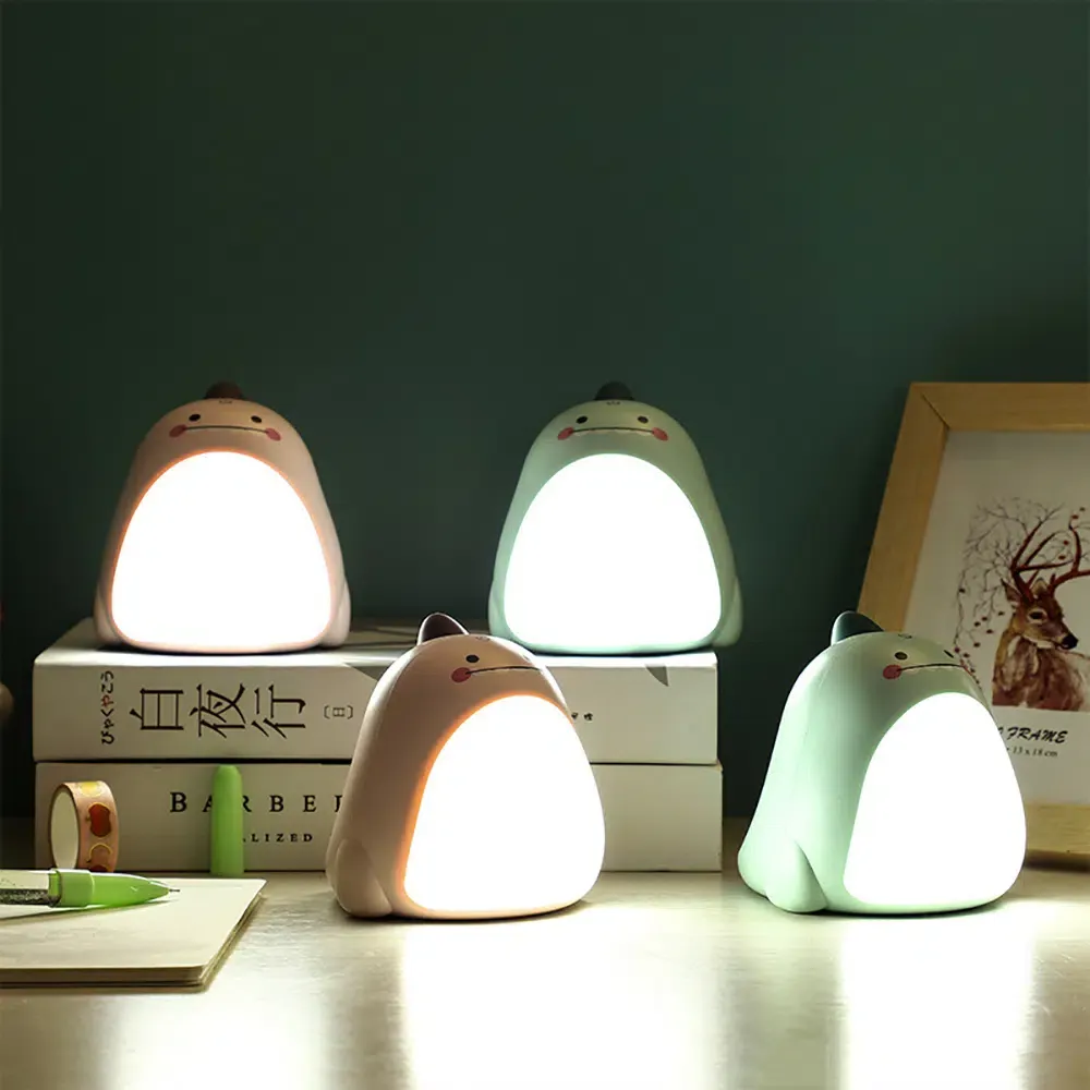 Veilleuse dinosaure vert ou rose avec ventre lumineux – Image 4